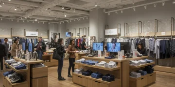 Modern retail store interior with engaged customers